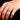 Close-up of a man's hand wearing the men's silver-tone ring with a multi-row cubic zirconia band