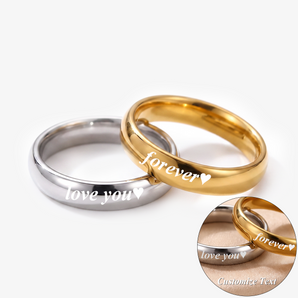 foreverとlove youを刻印したゴールドとシルバーのステンレス製カップルリング